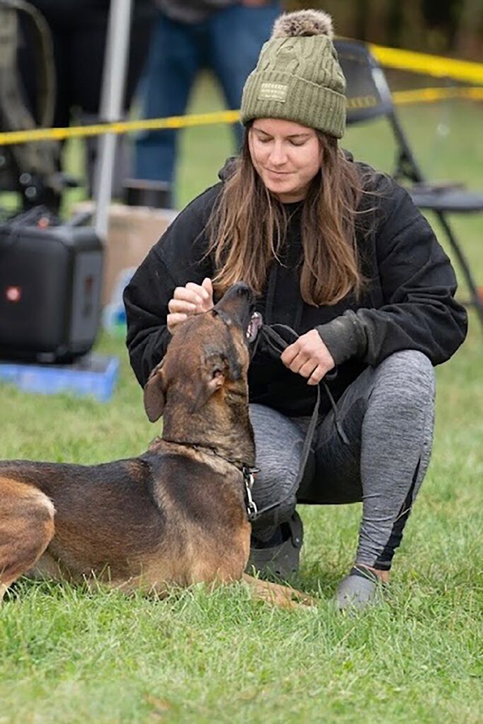 Megan, dog trainer at The Cultured Canine, training a dog with positive reinforcement.